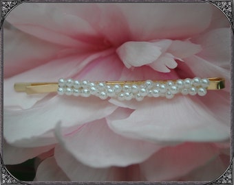 Pin with white beads
