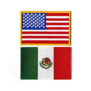 May include: Two embroidered patches: the American flag with red and white stripes, blue stars, and a gold border, and the Mexican flag with green, white, and red vertical stripes, and the Mexican coat of arms.