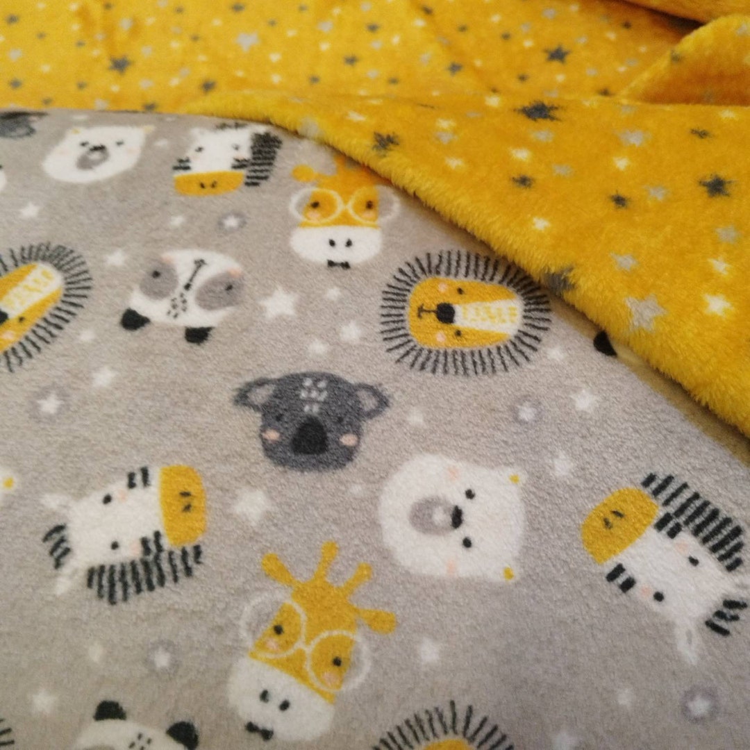 Double Sided Fleece Fabric Featuring Animals and on the Back Side