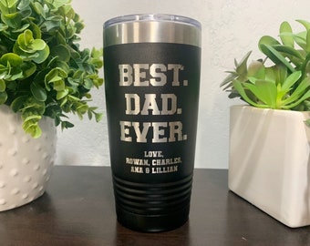 May include: Black stainless steel tumbler with a silver inscription that reads "BEST. DAD. EVER. LOVE, ROWAN, CHARLES, ANA & LILLIAN".