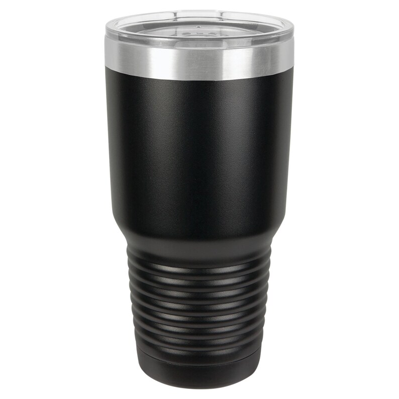 May include: A black stainless steel tumbler with a silver lid. The tumbler has a textured, ribbed design on the bottom half.