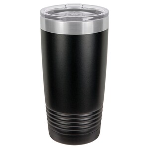 May include: A black stainless steel tumbler with a silver lid. The tumbler has a textured, brushed finish and a double-wall design for insulation.
