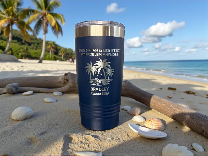May include: Navy blue insulated tumbler with a silver lid. The tumbler features a beach scene with palm trees and the text "Every sip tastes like it's not my problem anymore." Below the scene is the name "Bradley" and "Retired 2025."