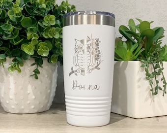 May include: White stainless steel travel mug with a silver owl design and the name "Donna" engraved on the front.