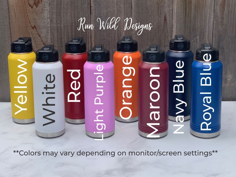 May include: Nine stainless steel water bottles in various colors, including yellow, white, red, light purple, orange, maroon, navy blue, and royal blue. The bottles are lined up in a row on a wooden surface. The text "Run Wild Designs" is visible at the top of the image.