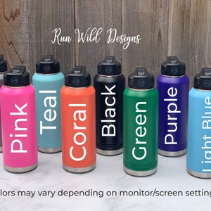 May include: Eight stainless steel water bottles in various colors, including dark gray, pink, teal, coral, black, green, purple, and light blue. The bottles are arranged in a row on a white surface. The text "Run Wild Designs" is visible at the top of the image.