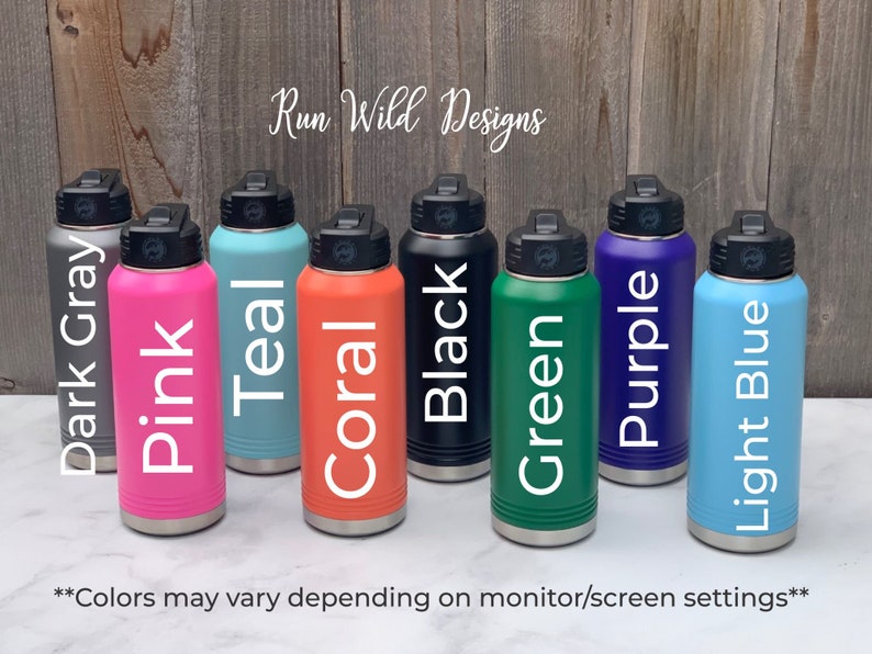 May include: Eight stainless steel water bottles in various colors, including dark gray, pink, teal, coral, black, green, purple, and light blue. The bottles are arranged in a row on a white surface. The text "Run Wild Designs" is visible at the top of the image.