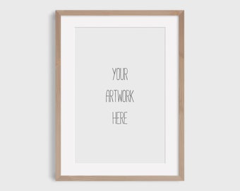 May include: A light wood picture frame with a white mat and the text "YOUR ARTWORK HERE" in the center.