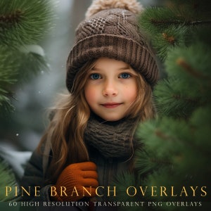 May include: A young girl wearing a brown knit hat with a pom pom and a brown scarf, looking at the camera. She is standing in front of a pine tree with green needles.