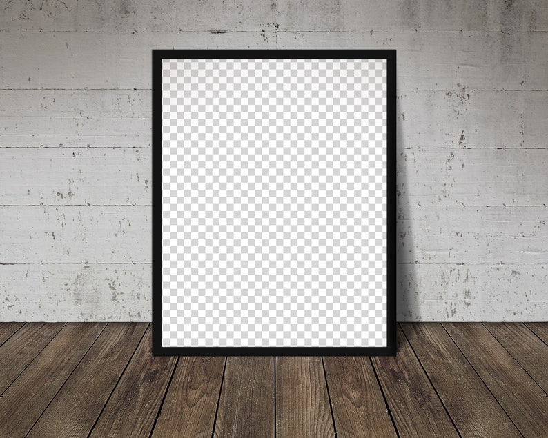 May include: A black picture frame with a blank white canvas inside. The frame is hanging on a white brick wall above a wooden floor.