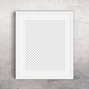 May include: A white picture frame with a white mat, hanging on a textured gray wall.