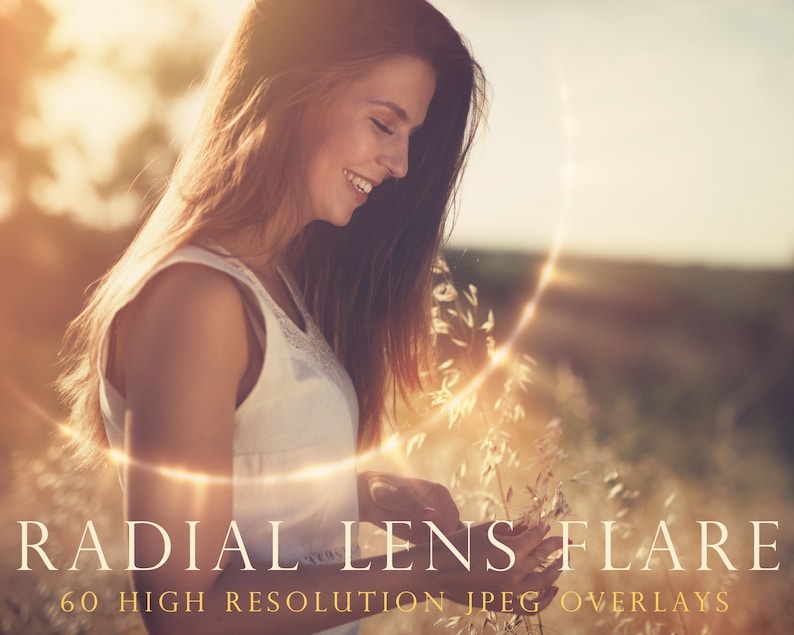 May include: A woman with long brown hair smiles while holding a sprig of flowers in a field. A bright, golden radial lens flare effect surrounds her, creating a warm and ethereal glow.