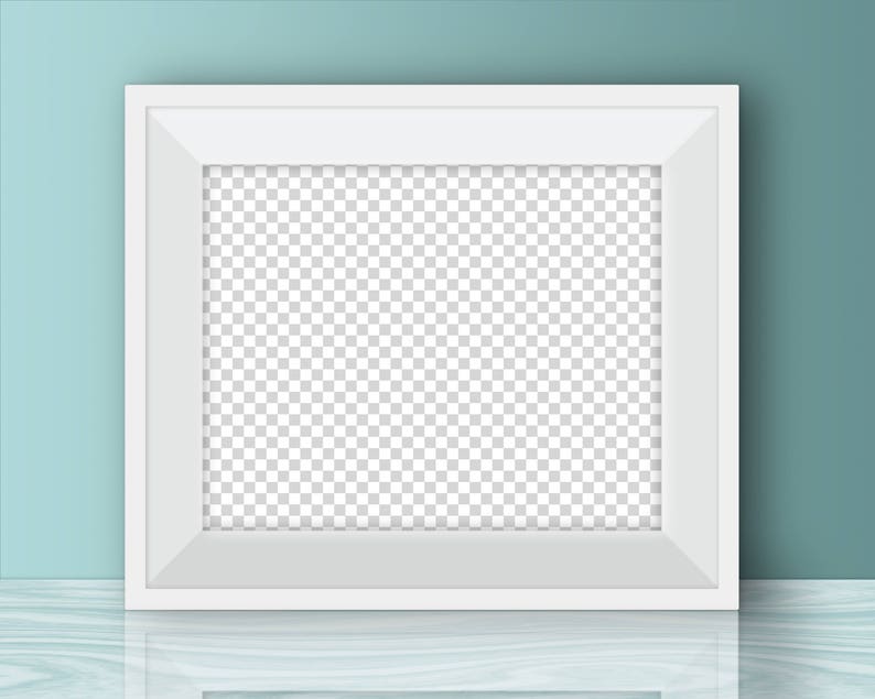 May include: A white picture frame with a blank space for a photo or artwork. The frame is sitting on a light blue surface.