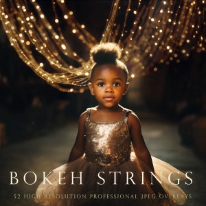 May include: A young girl with dark brown hair in a bun wears a gold sequined dress and a tulle skirt. She is standing in front of a background of golden string lights.