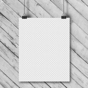 Puede incluir: Una maqueta de p&oacute;ster blanco colgada en un fondo de madera blanqueada. El p&oacute;ster est&aacute; sujeto por dos clips negros.