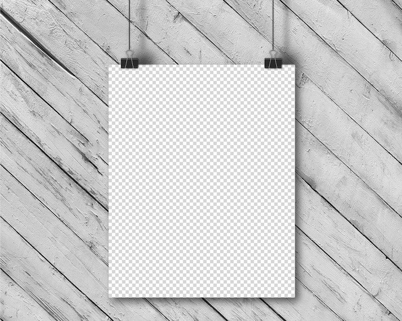Puede incluir: Una maqueta de p&oacute;ster blanco colgada en un fondo de madera blanqueada. El p&oacute;ster est&aacute; sujeto por dos clips negros.