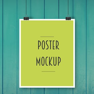May include: A white framed poster mockup with a green background and the text "POSTER MOCKUP" in black.