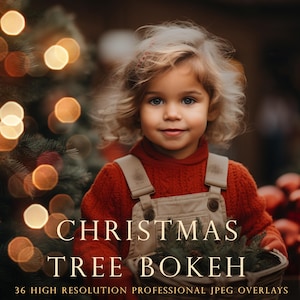 May include: A young child wearing a red jumper and dungarees stands in front of a Christmas tree with warm, blurry lights. The text "Christmas Tree Bokeh" is written in a gold font below the child. The text "36 High Resolution Professional JPEG Overlays" is written in a smaller font below the main text.