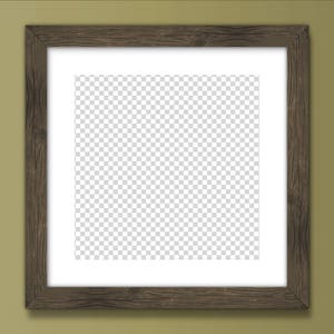 May include: A brown wooden picture frame with a white mount and a clear, transparent background. The frame is on a green wall.