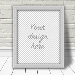 May include: A white picture frame with a gray mat and a transparent background. The text "Your design here" is written in the center of the frame.