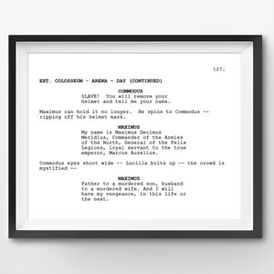 May include: A framed print featuring a movie script page. The text includes scene directions and dialogue from a film, with the character names COMMODUS and MAXIMUS. The script is in black font on a white background, framed in a black frame.