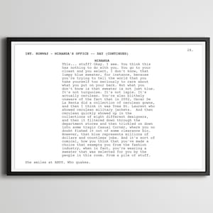 May include: A framed print of a movie script page. The text is in black against a white background, with the title "INT. RUNWAY - MIRANDA'S OFFICE - DAY (CONTINUED)". The script is a monologue about a blue sweater.