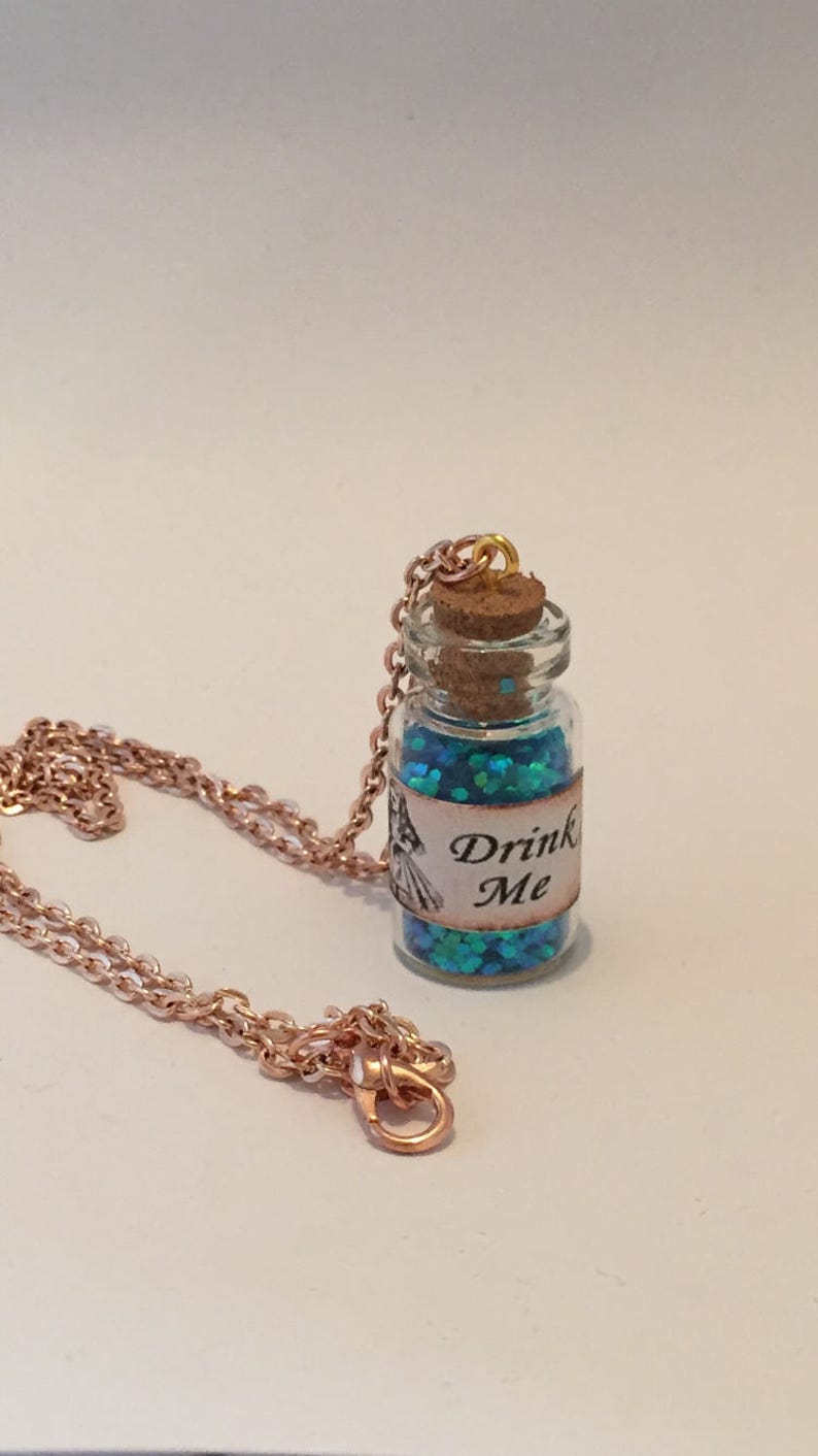 Drink me inspired necklace Tea party alice wonderland inspired necklace item 388 by CraftyLittleMonkeyGB Drink me potion necklace