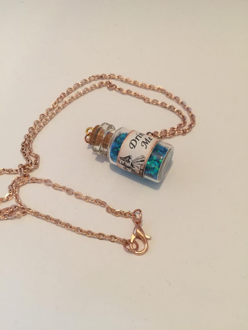 Drink me inspired necklace Tea party alice wonderland inspired necklace item 388 by CraftyLittleMonkeyGB Drink me potion necklace