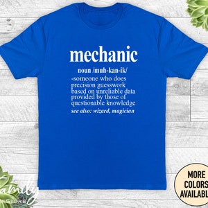 May include: A blue t-shirt with a white graphic that defines the word "mechanic" as someone who does precision guesswork based on unreliable data provided by those of questionable knowledge. The graphic also says "see also: wizard, magician".