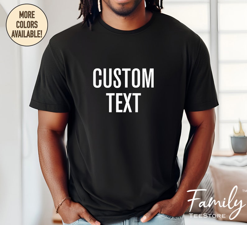 May include: A black t-shirt with the text "CUSTOM TEXT" printed in white on the front.