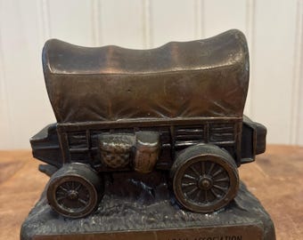 Vintage Banthrico covered wagon coin bank