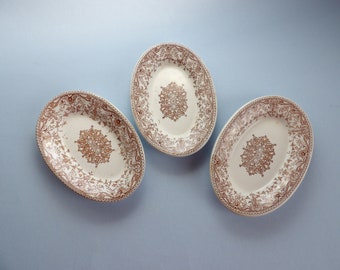 T&R Boote transferware group of 3 oval plates in Tournay Brown