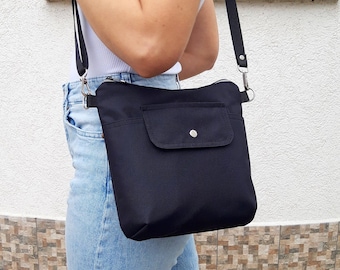 Schwarze wasserabweisende Umhängetasche, leichte Reisebrusttasche, lässige Geldbörse für Frauen
