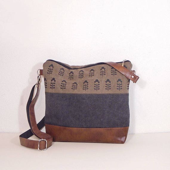 Black canvas and brown leather bag