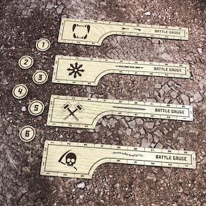 May include: Four wooden battle gauges with different symbols, including a skull, a hammer and sickle, a star, and a set of teeth. Each gauge has a numbered scale from 1 to 9. The gauges are on a brown, rocky surface.