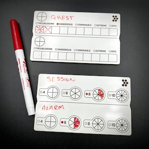 May include: Two white cards with red markings. The top card has the word "QUEST" written in red and has a scale with the words "Troublesome", "Dangerous", "Formidable", "Extreme", and "Epic". The bottom card has the word "SESSION" written in red and has a scale with the words "04", "06", "08", and "10". The word "ALARM" is written in red below the scale. There are red markings on the scale.