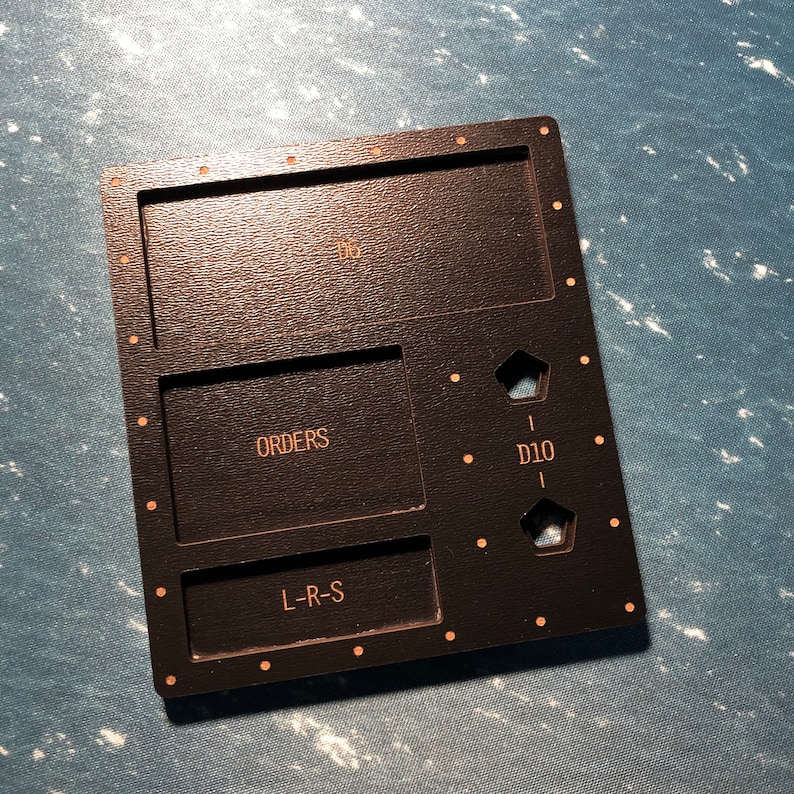 May include: Black wooden game tray with compartments labelled "D6", "ORDERS", "L-R-S", and "D10".