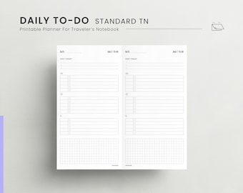 Könnte beinhalten: Ein druckbarer Tagesplaner für ein Traveler's Notebook. Der Planer hat zwei Spalten mit Abschnitten für Datum, tägliche Aufgaben und nicht vergessen. Jede Spalte hat einen Gitterabschnitt am unteren Rand.