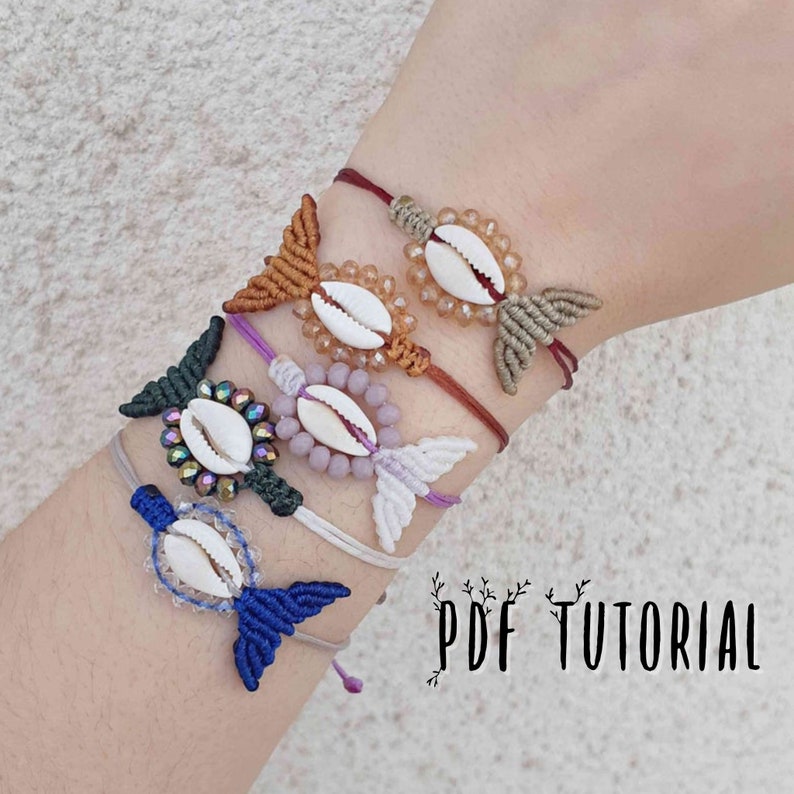 May include: A stack of colorful bracelets with seashell charms and beaded accents. The bracelets are tied with knots and have a fishtail design. The text "PDF TUTORIAL" is visible in the bottom right corner of the image.