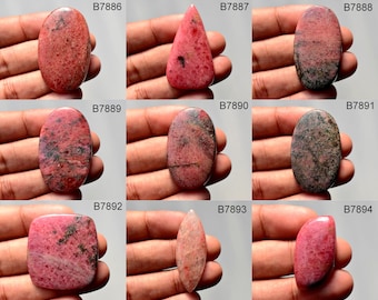 May include: Assortment of 10 pink and gray cabochon gemstones, each with a unique shape and pattern. The stones are labeled with their corresponding product numbers, B7886 through B7894.