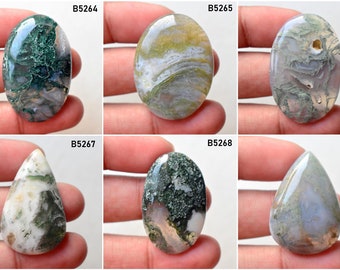 May include: Six different green, white, and brown agate cabochons, each with a unique pattern. The cabochons are oval and teardrop shaped. The cabochons are labeled with the numbers B5264, B5265, B5266, B5267, B5268, and B5269.