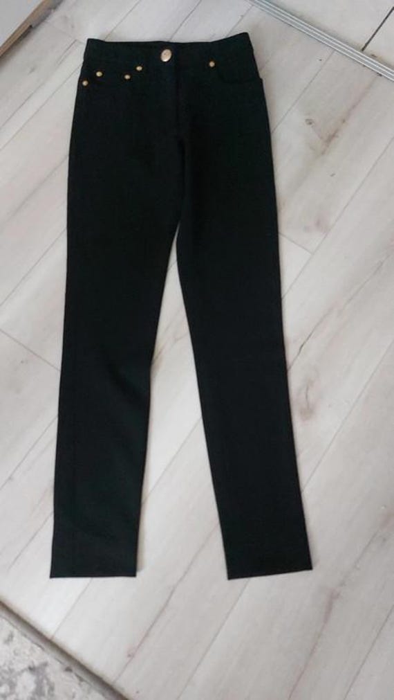パンツ MOSCHINO COUTURE Woman Pants Black 03045524 0555 Pantaloni Donna nero con maxi fibbia placcata oro MOSCHINO