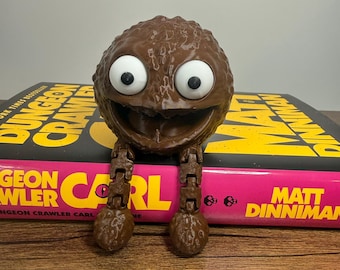 Dungeon Crawler Carl Garret the Tummy Archer Flexi Bookshelf Sitter
