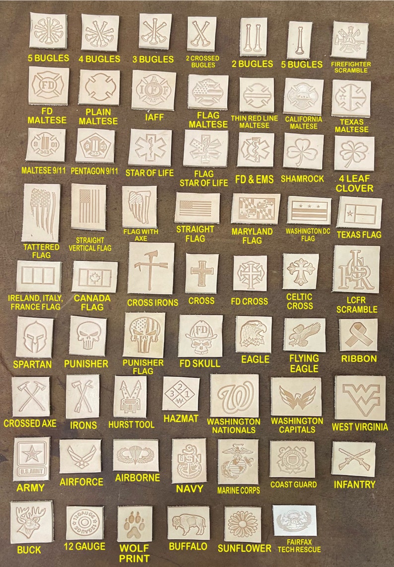 May include: A collection of small, square leather patches with various designs. The patches feature images such as flags, military emblems, and symbols like a shamrock, eagle, and cross. Text includes "FD Maltese", "Army", and "Coast Guard".