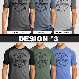 May include: A collection of six short-sleeved t-shirts in various colors, including charcoal, navy, and green. Each shirt features the text "THIS IS WHAT 50 AND AWESOME LOOKS LIKE!" in a distressed font. The shirts are displayed on a person.