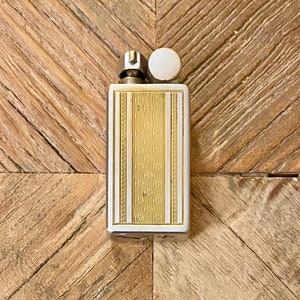 Dandy petrol lighter - Antique