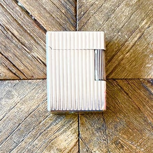 S. T. Dupont lighter - Line 1 - Small model - Vertical-line design - Silver-plated - Initials "FG" - Vintage