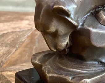Bronze sculpture of a black panther drinking in a pond, reproduction after an original artwork by Belgian artist Michel Decoux