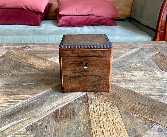 Rosewood box with refined inlaid copper designs