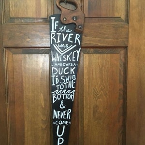 Painted antique, saw whiskey, man cave decor, whiskey bar